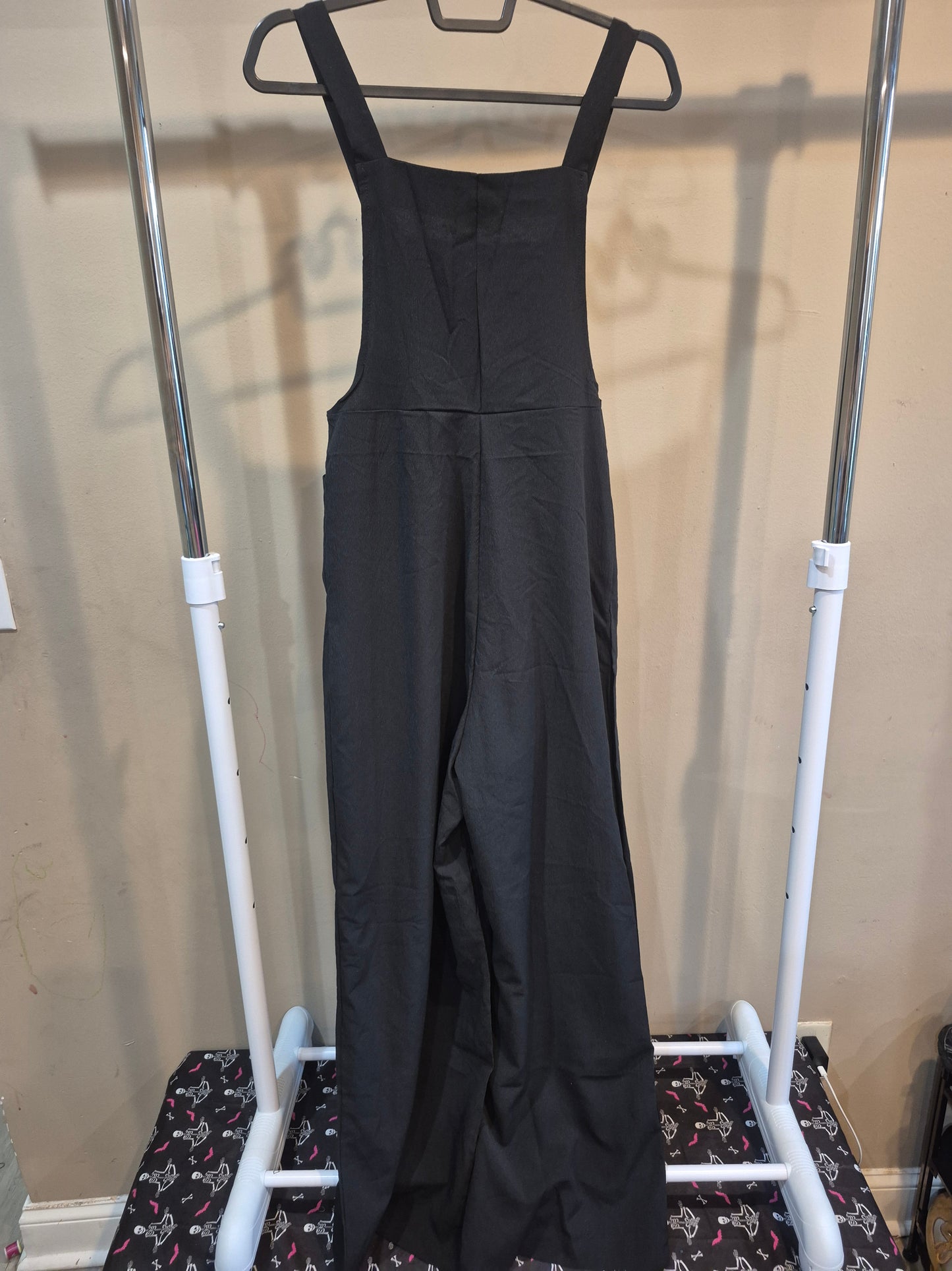 Black fabric overalls